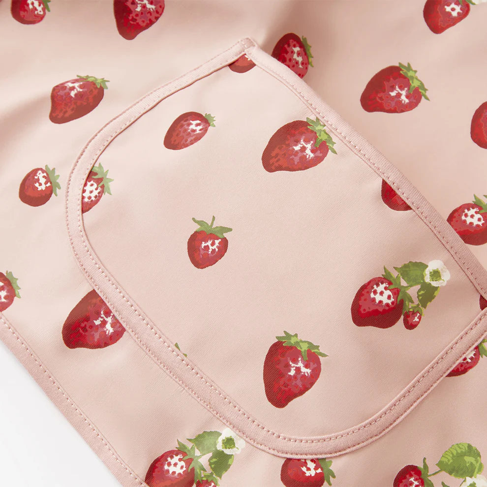 close-up of pocket on strawberry long sleeve bib