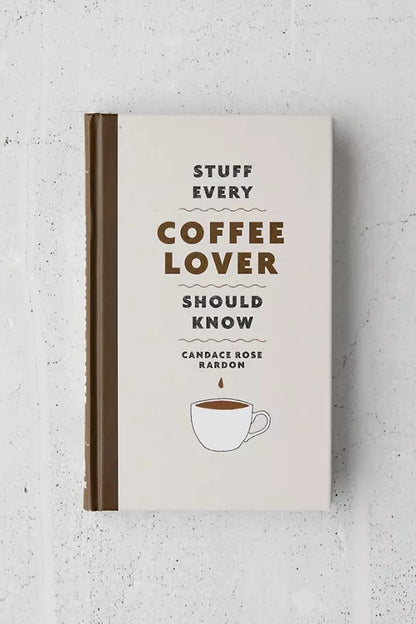 Book titled 'Stuff Every Coffee Lover Should Know' on a textured surface