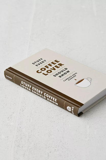 Book titled 'Stuff Every Coffee Lover Should Know' on a light gray surface