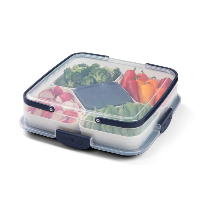 Party Carrier filled with veggies and dip with lid on it for transport