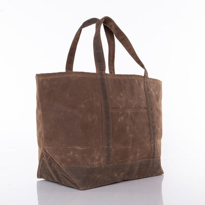 angled view of the brown waxed canvas tote