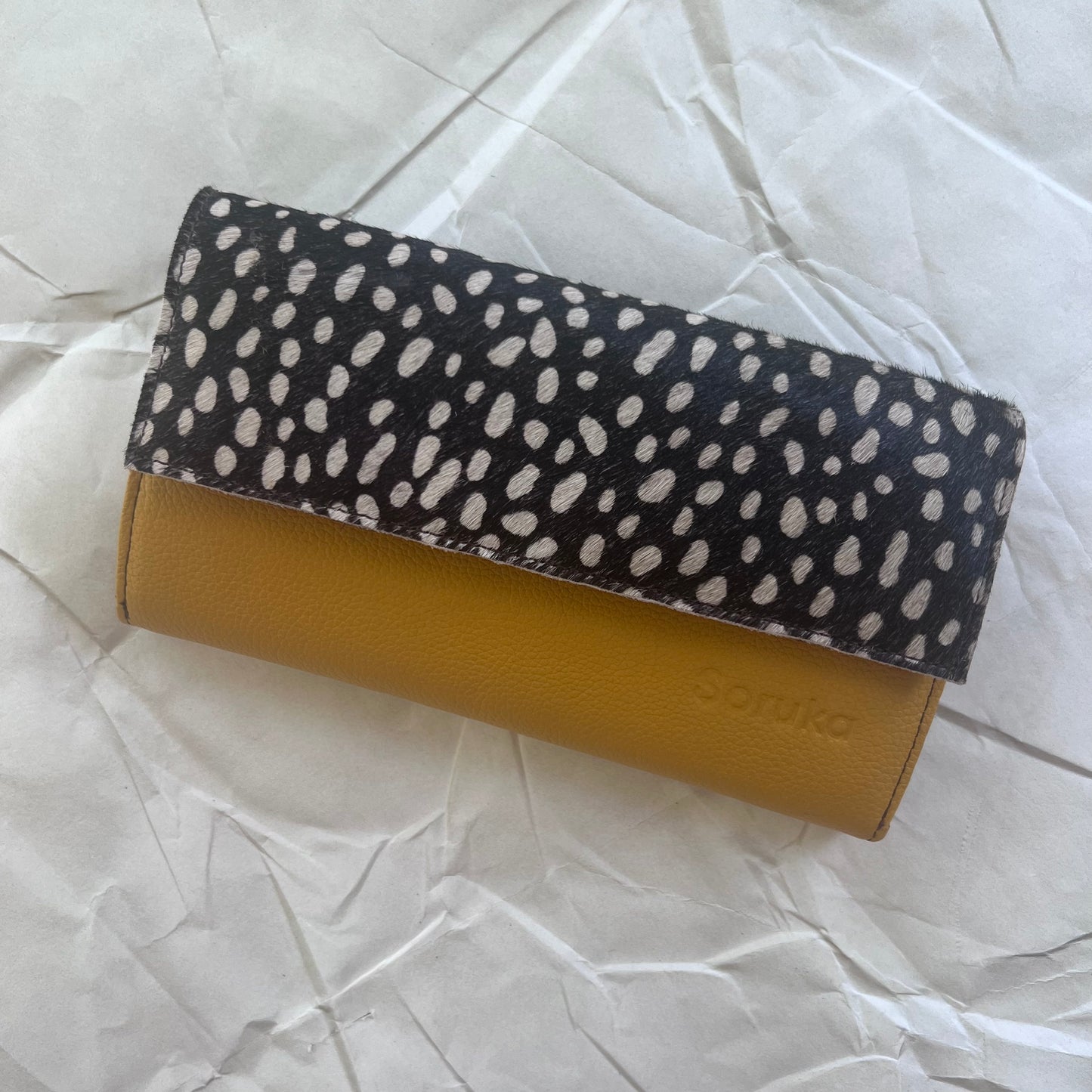 honey Amelia Clutch Wallet with yellow body and black and white dotted animal print flap