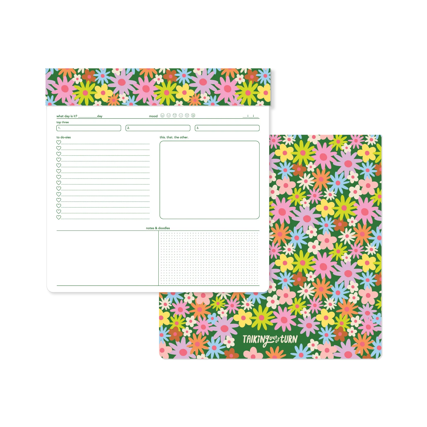 Floral patterned planner with a white section for writing on a white background