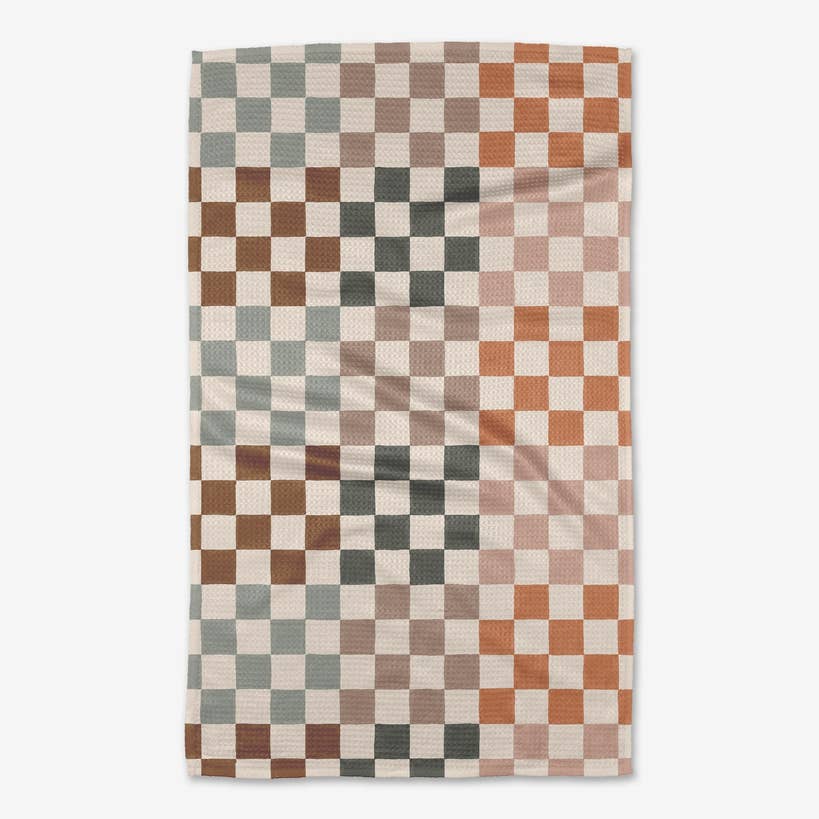 autumn checkers tea towel folded on a white background