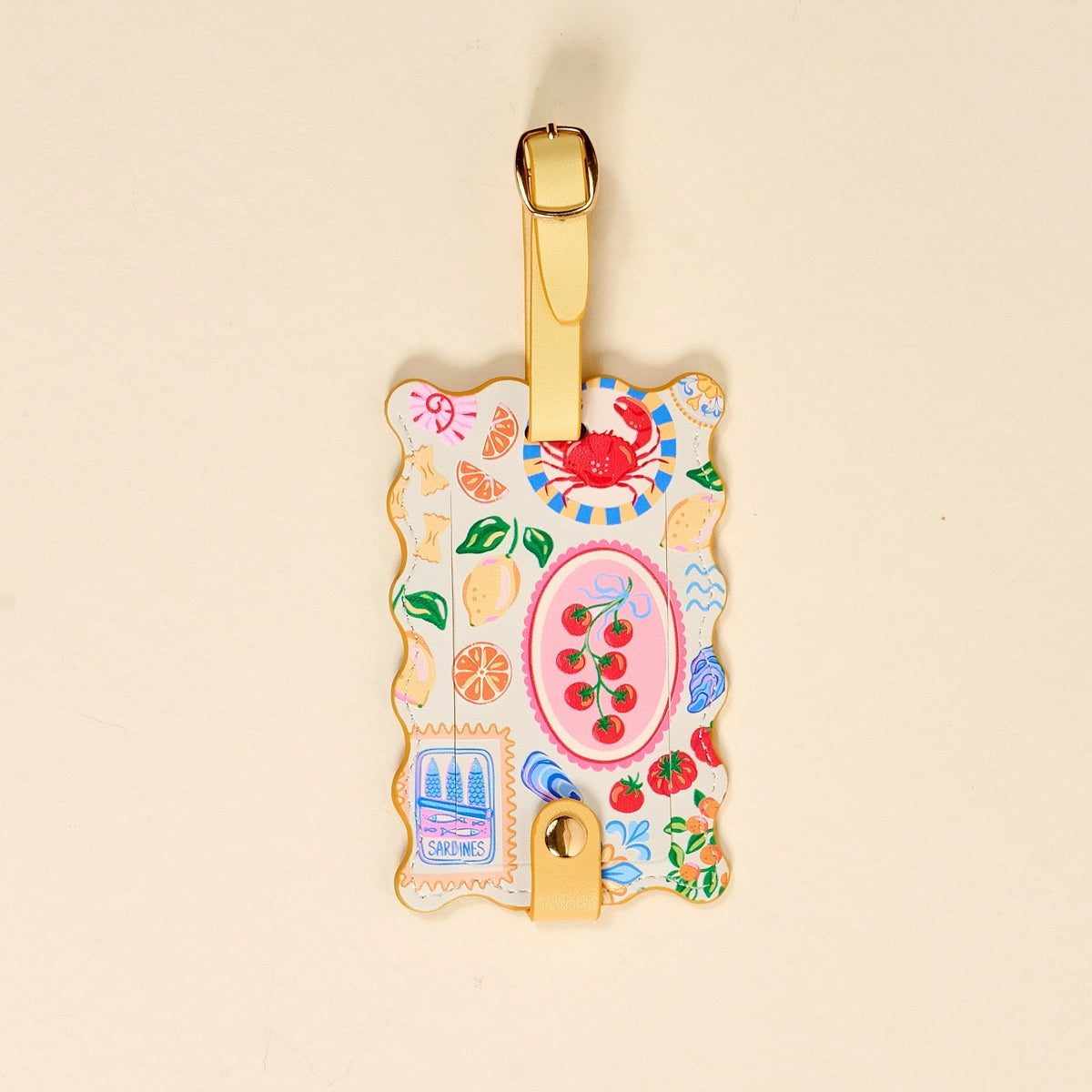 Decorative luggage tag with colorful designs on a beige background