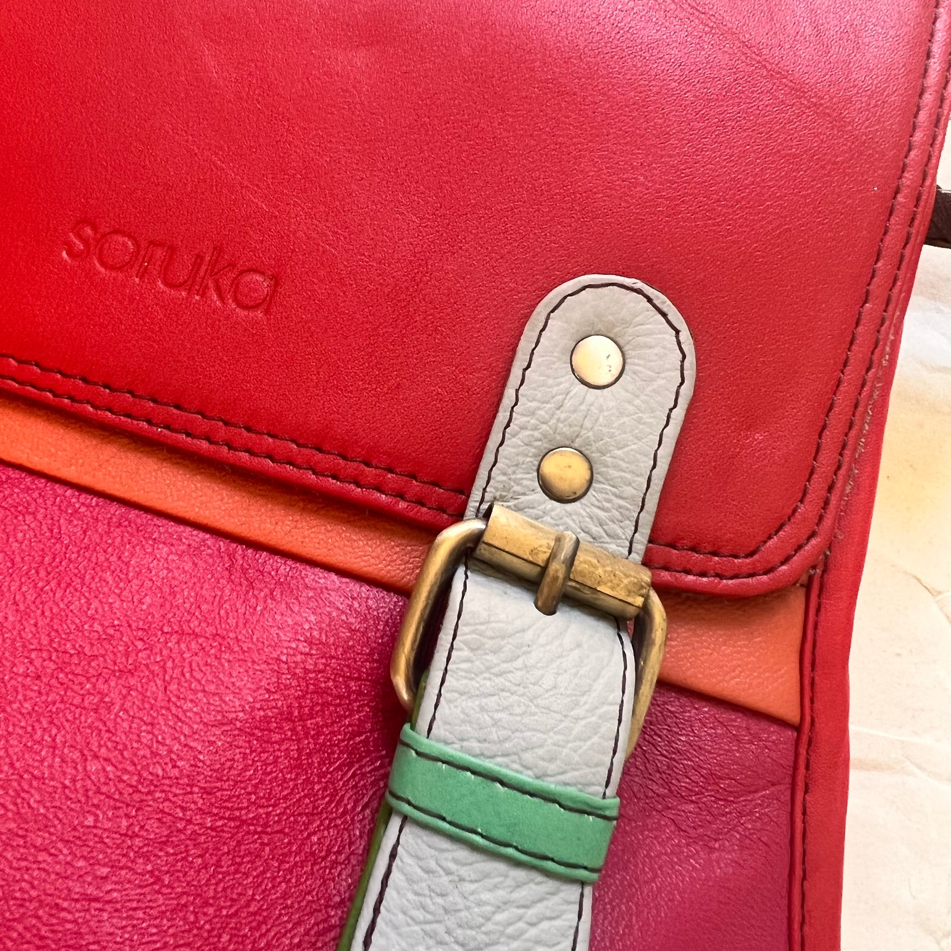 close-up of buckle on freya backpack.