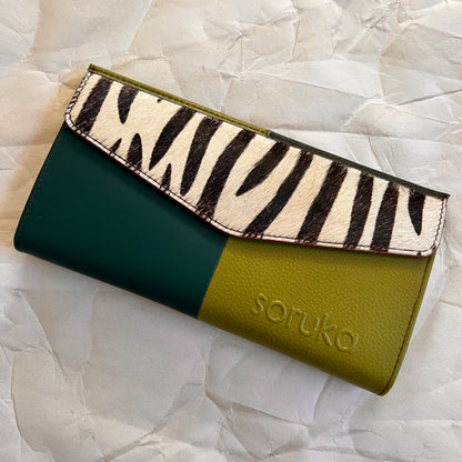 green judith wallet with animal print flap.