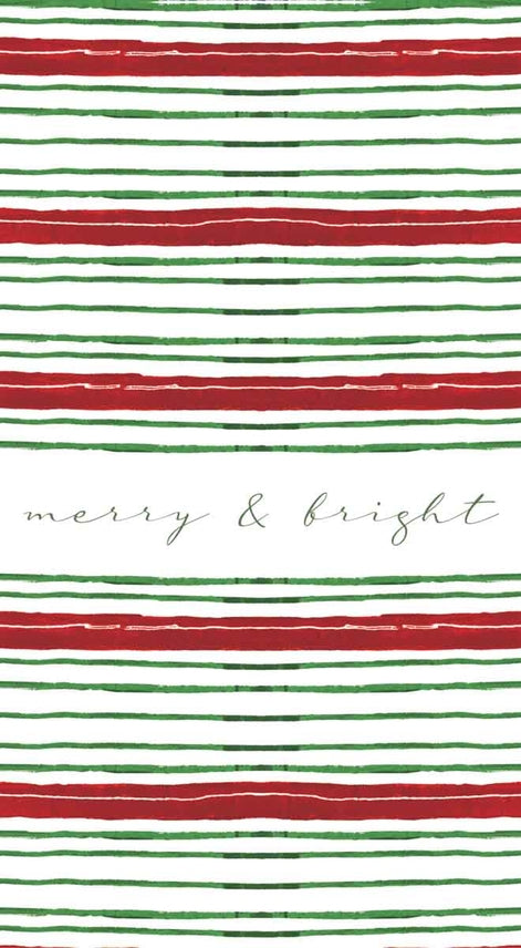 A festive holiday patterned paper napkin featuring horizontal stripes in red and green watercolor on a white background, with the words 'merry & bright' written in a delicate cursive font across the center.