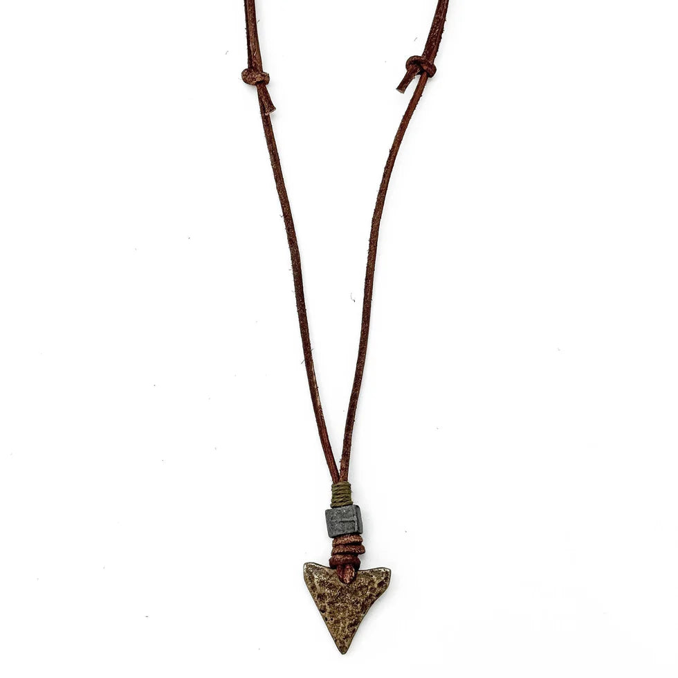 Necklace with an arrowhead pendant on a white background