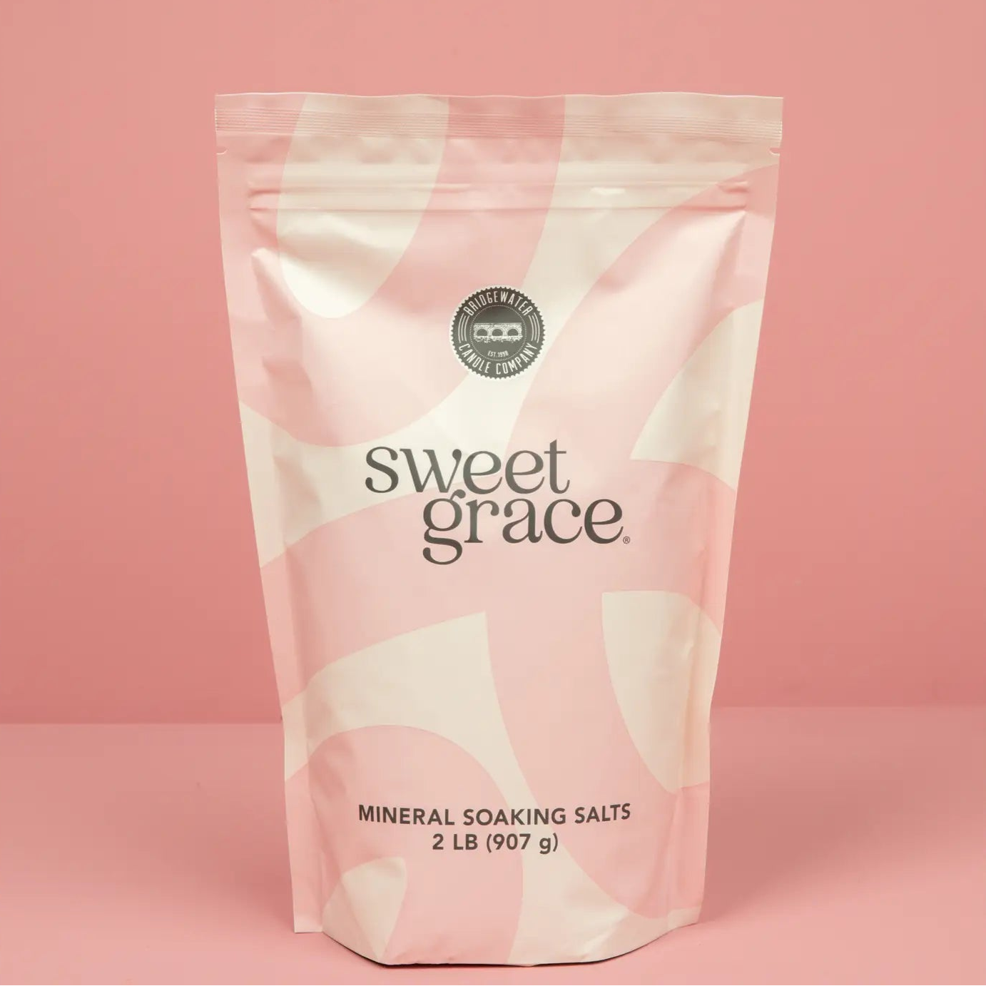 Bag of sweet grace mineral soaking salts on a pink background