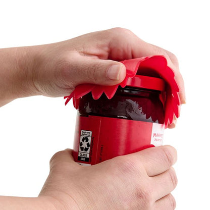 hands using red Silicone Jar Opener to open a jar of jelly