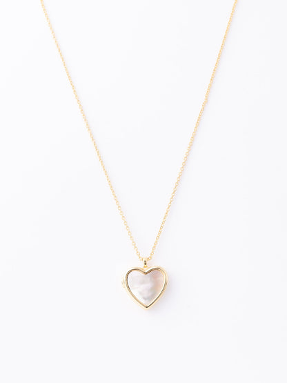 Saylor Heart Locket Necklace with pearlized heart pendant on a a gold chain
