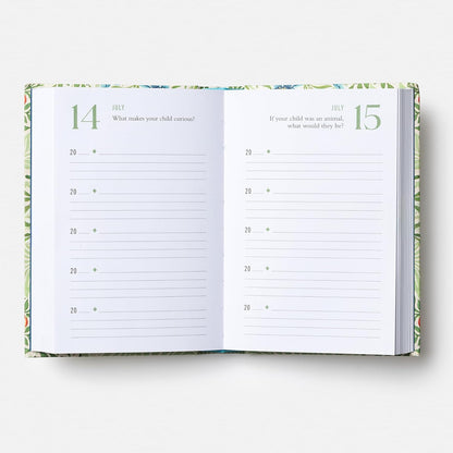 Open planner with lined pages and decorative edges on a white background