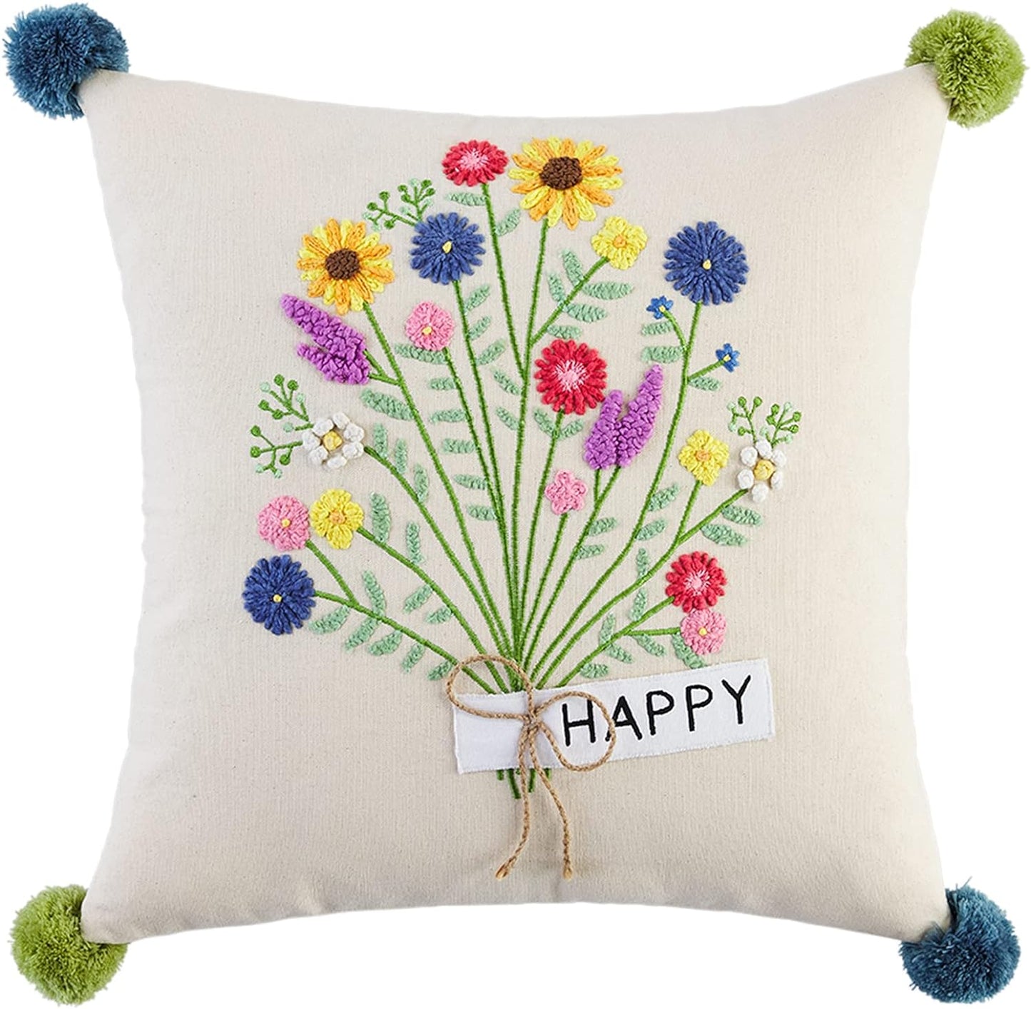 happy pillow with a bouquet of embordered pillows tied witha tag printed "happy" with blue and green poms in each corner.