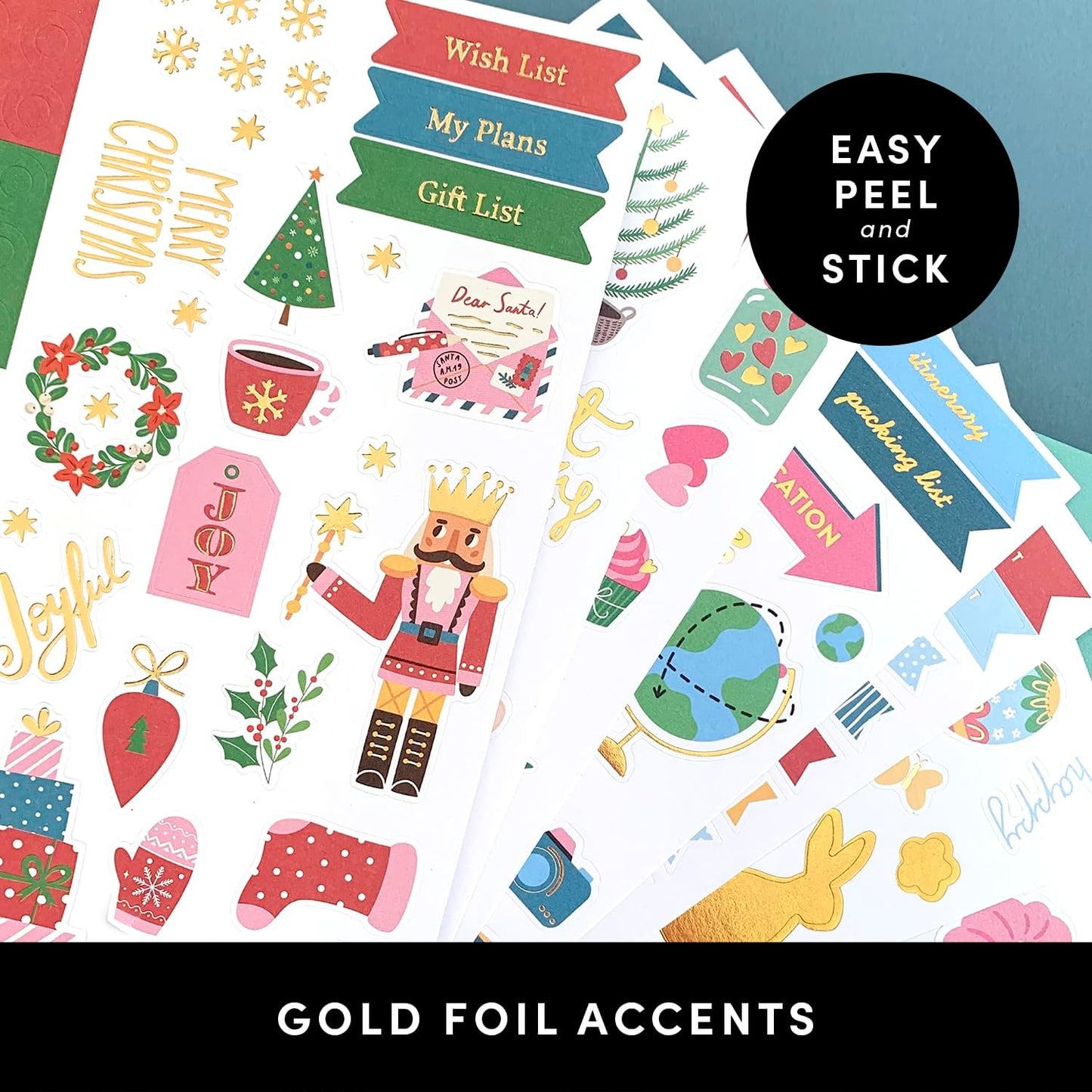sheets of stickers with seasonal designs fanned out on a blue background