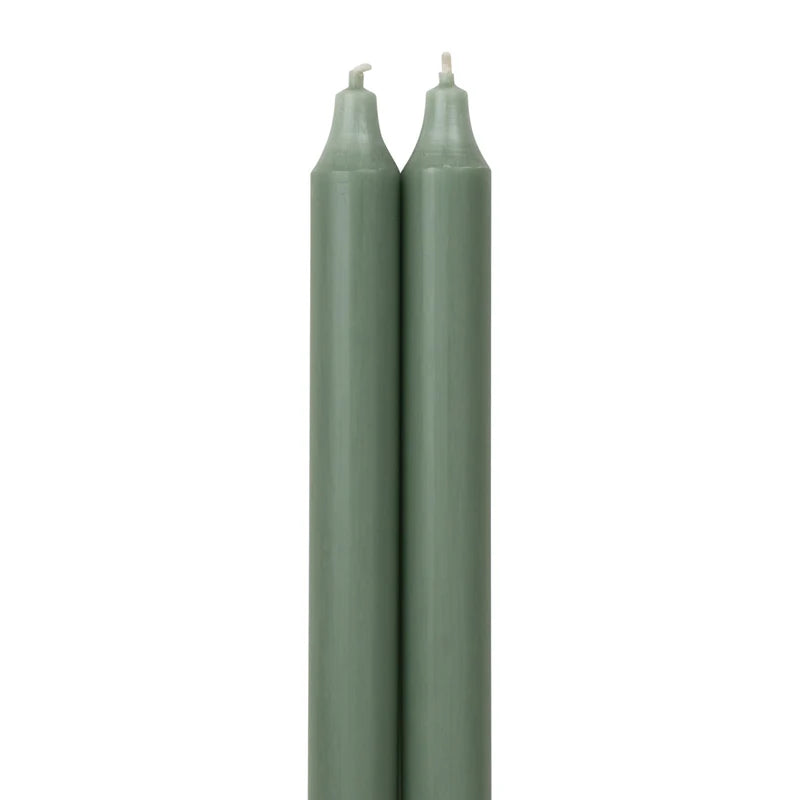 2 Eucalyptus  colored tapers on a white background.