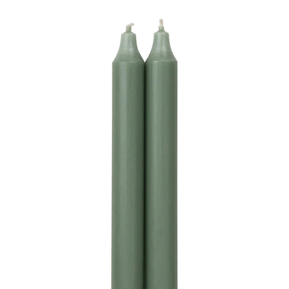 2 Eucalyptus  colored tapers on a white background.