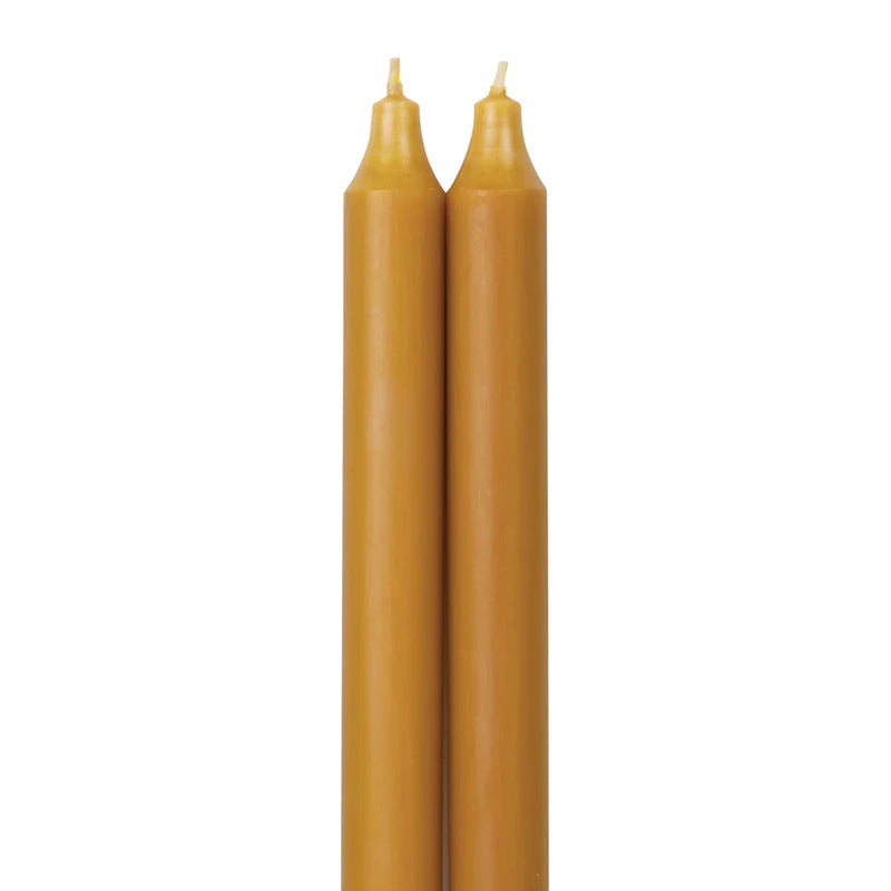 2 caramel colored tapers on a white background.