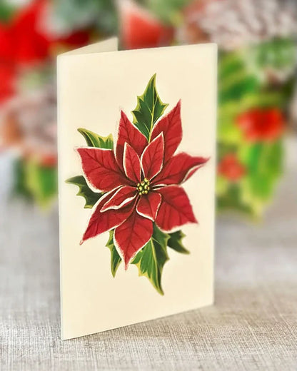 Enclosure card with image of a vibrant red poinsettia on it