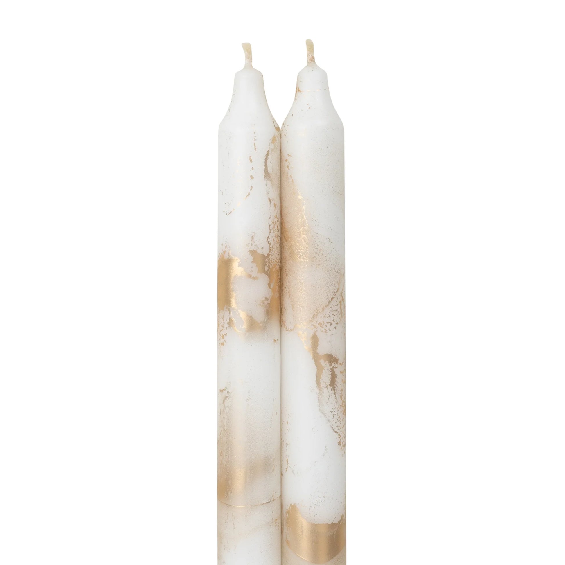 2 pure white and gold marbled taper candles next to each other