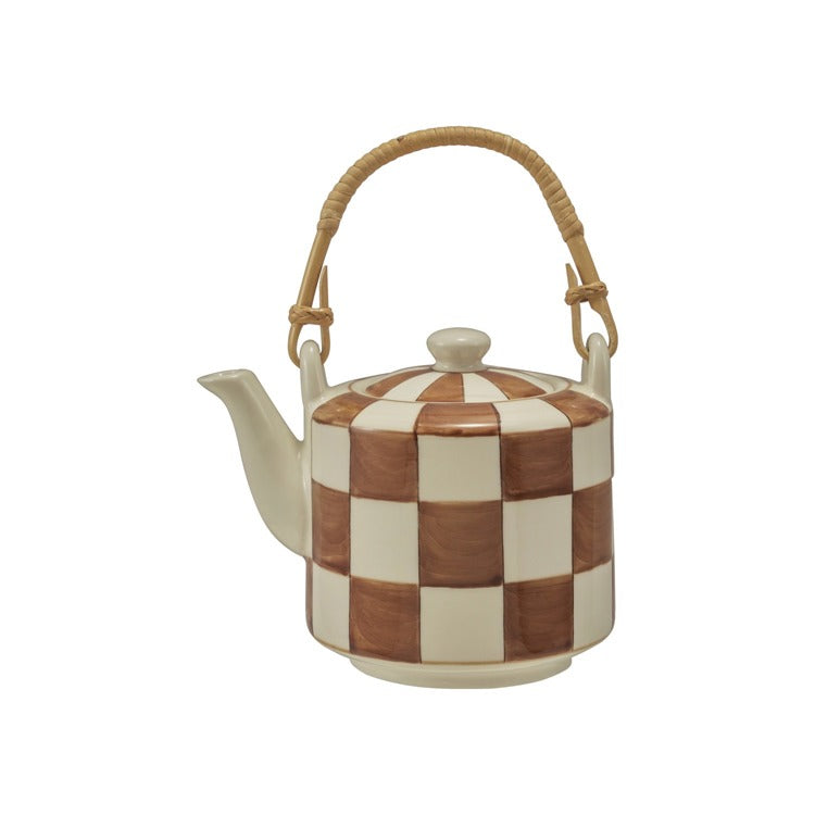 Teapot with brown checkered pattern and woven handle on a white background