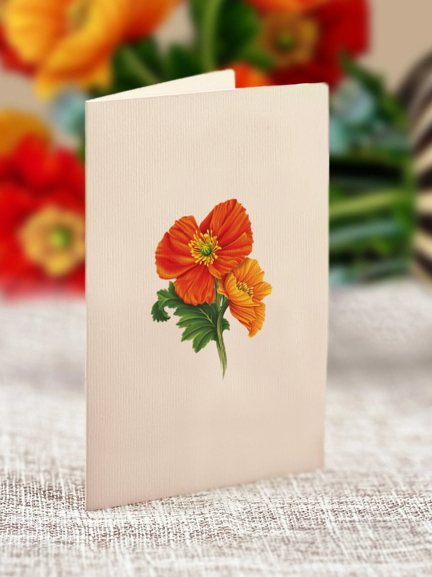 close-up of enclosure card with poppies printed on it.