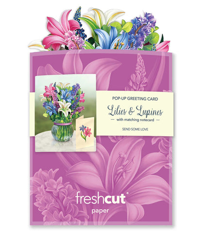 Lilies & Lupines bouquet in its mailing envelope.