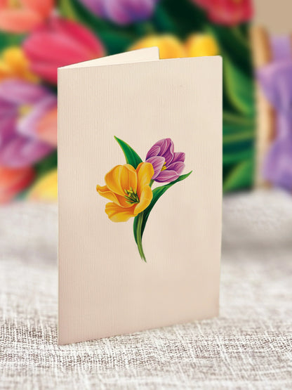 close-up of enclosure card with tulips printed on it.
