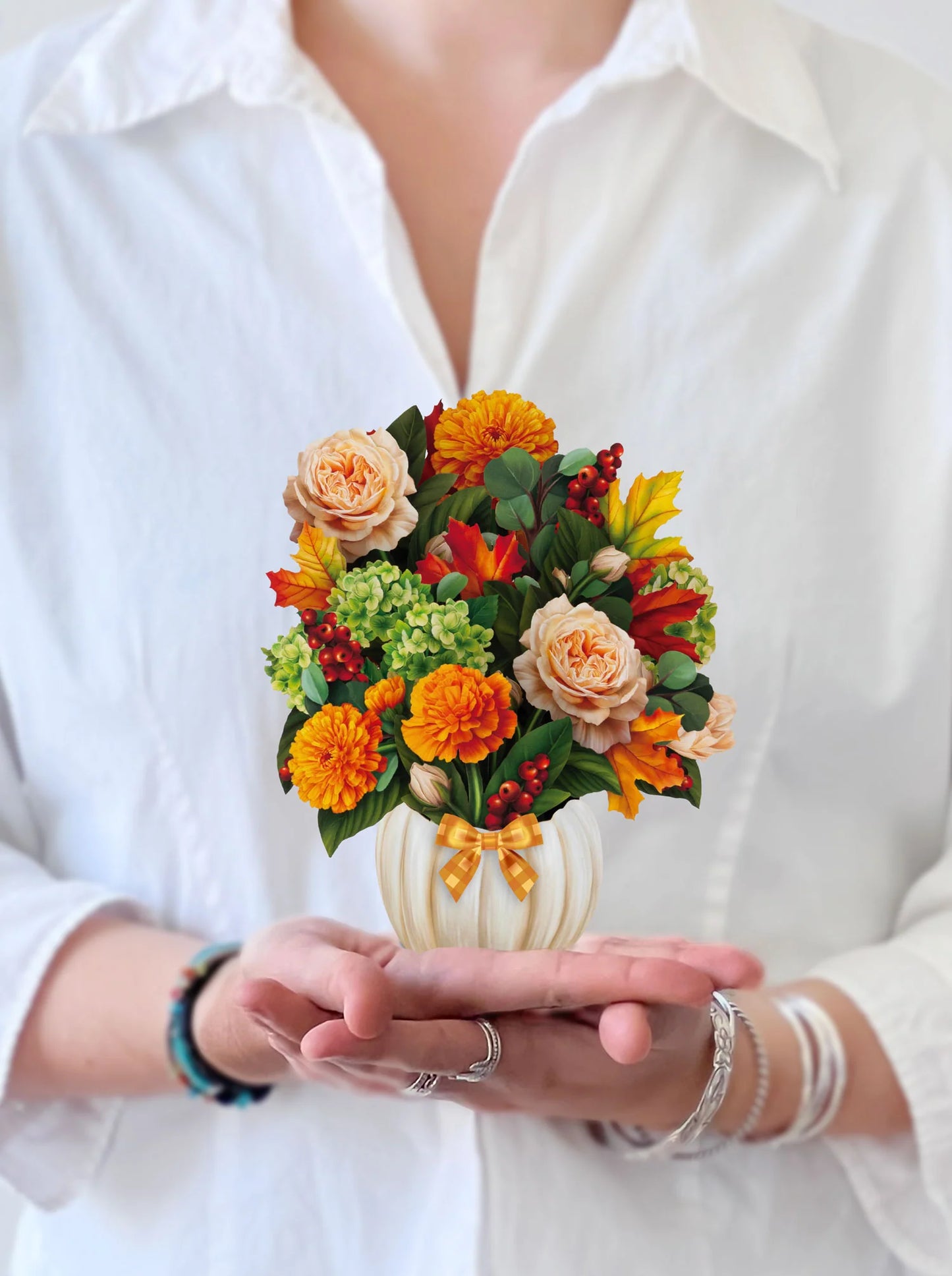 hands holding pumpkin spice Pop-Up Greeting Card.