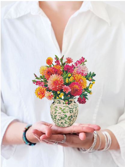 a person holding the Sunrise Dahlia Mini Pop-Up Card