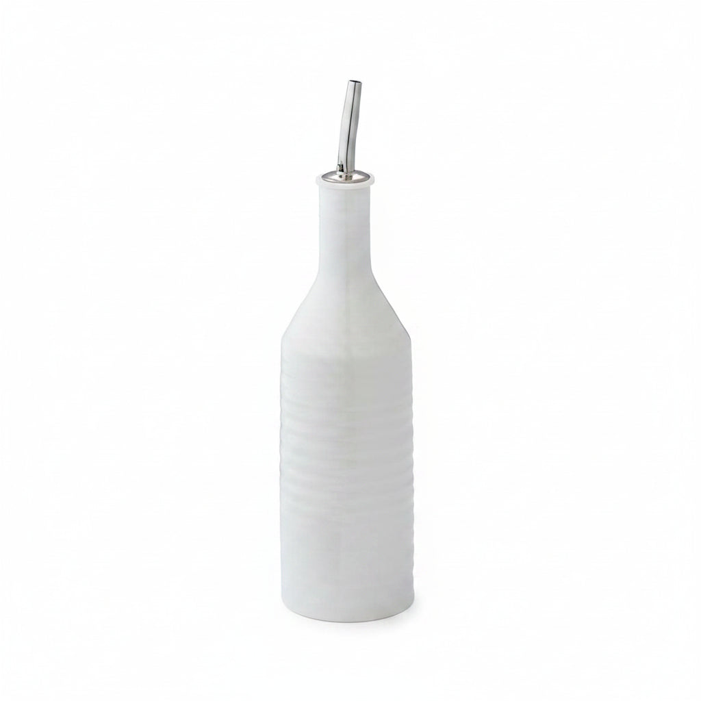 small white ceramic oil bottle