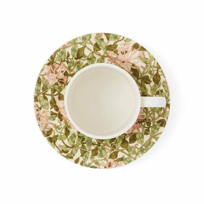 top down view of the honeysuckle teacup & saucer on a white background