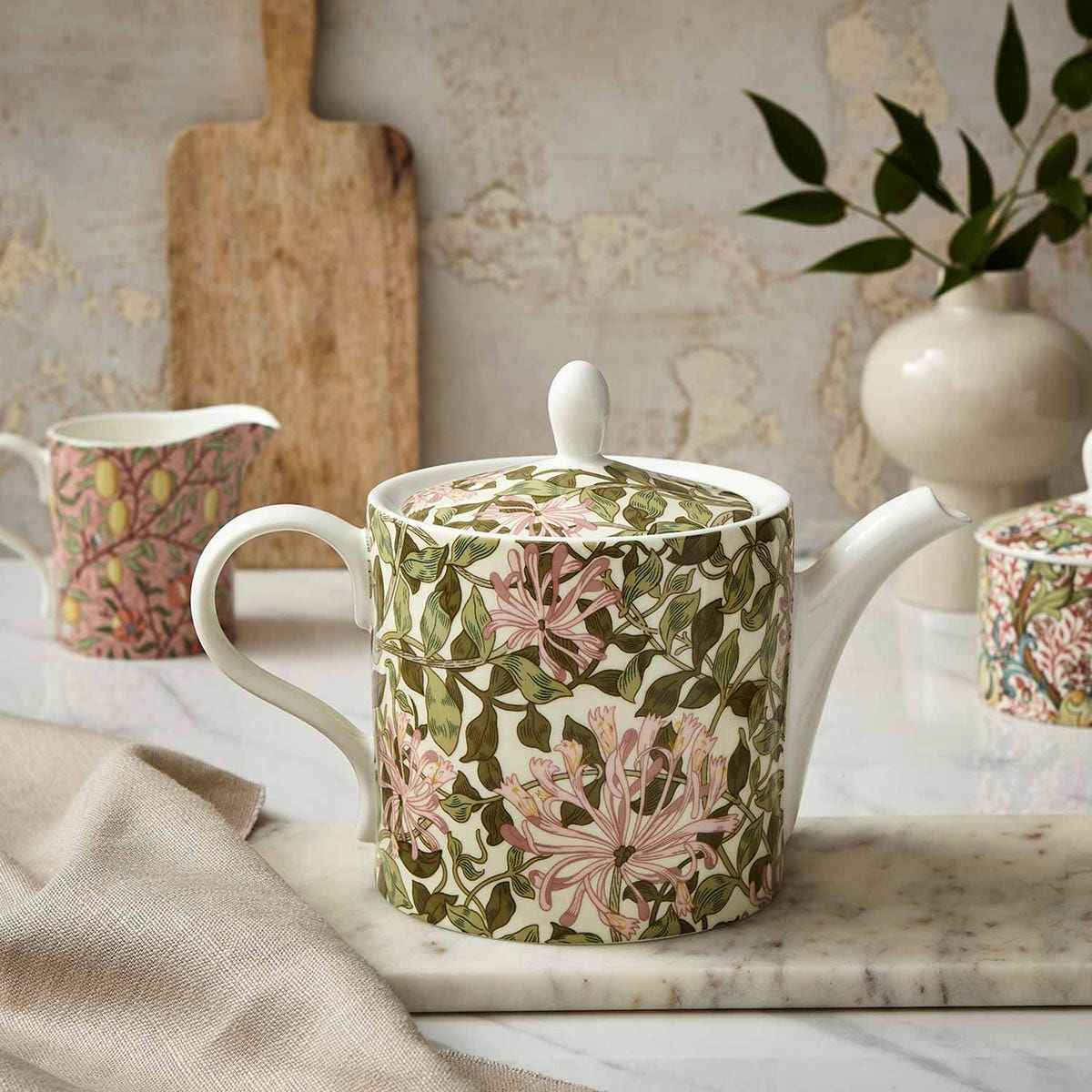 honeysuckle teapot on a decorated setting