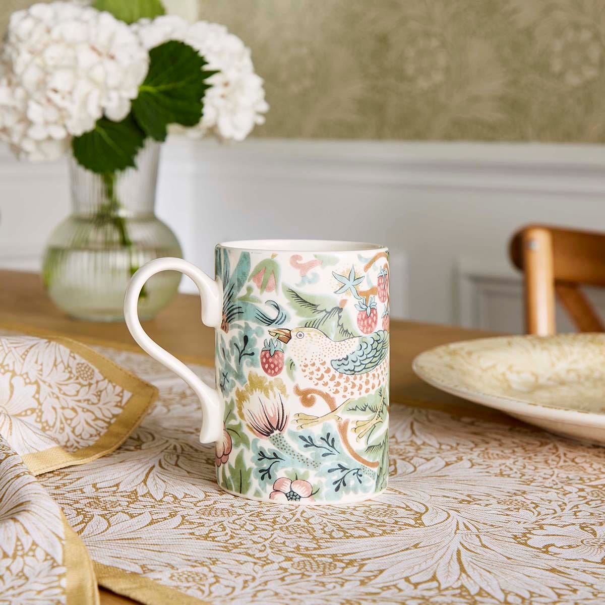 strawberry thief mug on a set table