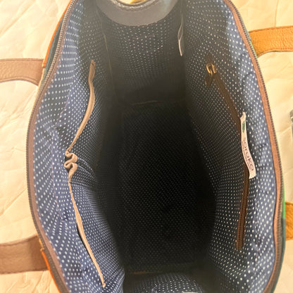 interior view of  giselle tote showing slip and zip pockets.