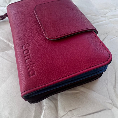 side view of red Beatrice Clutch