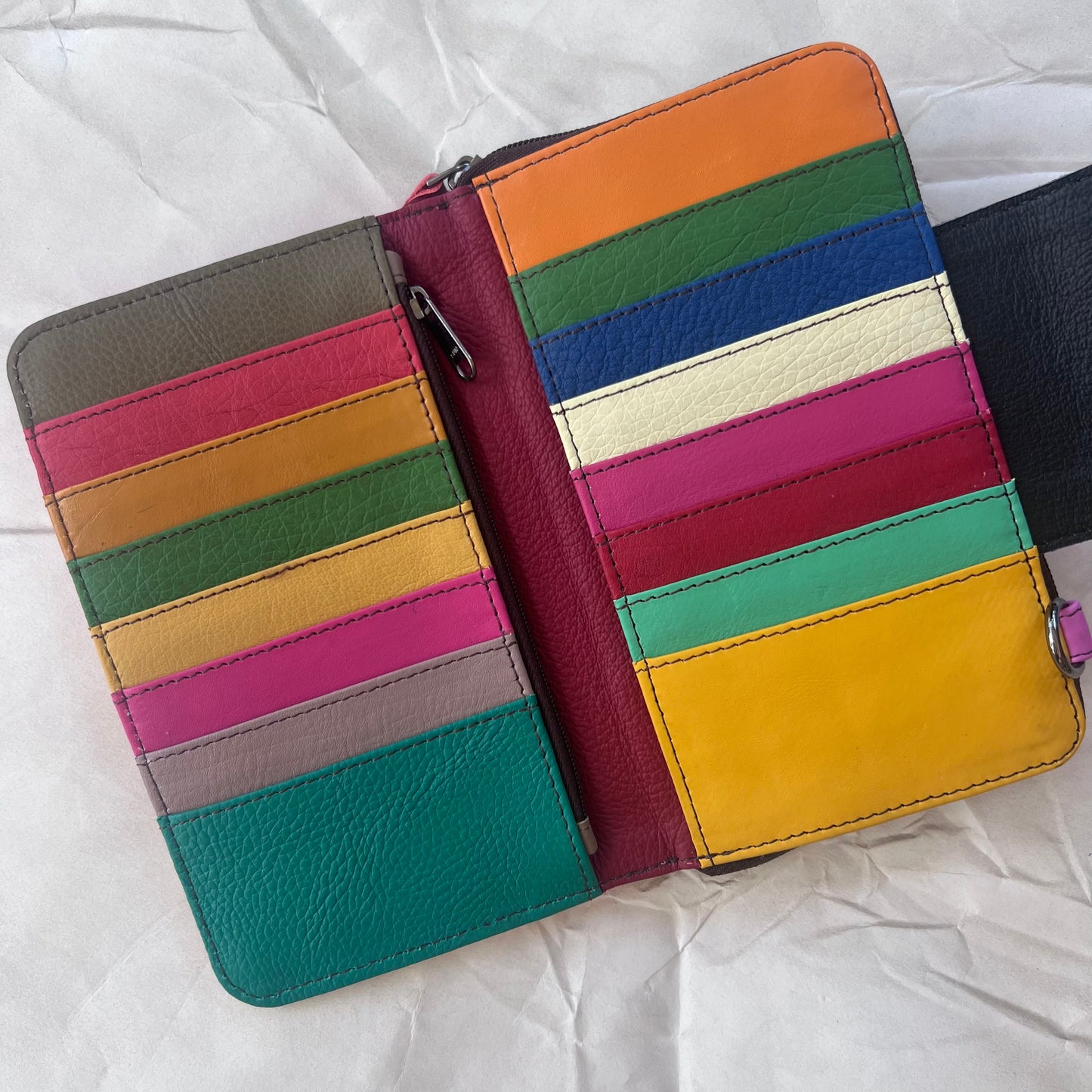 view under magnetic flap of pink Beatrice Clutch showing colorful card slots