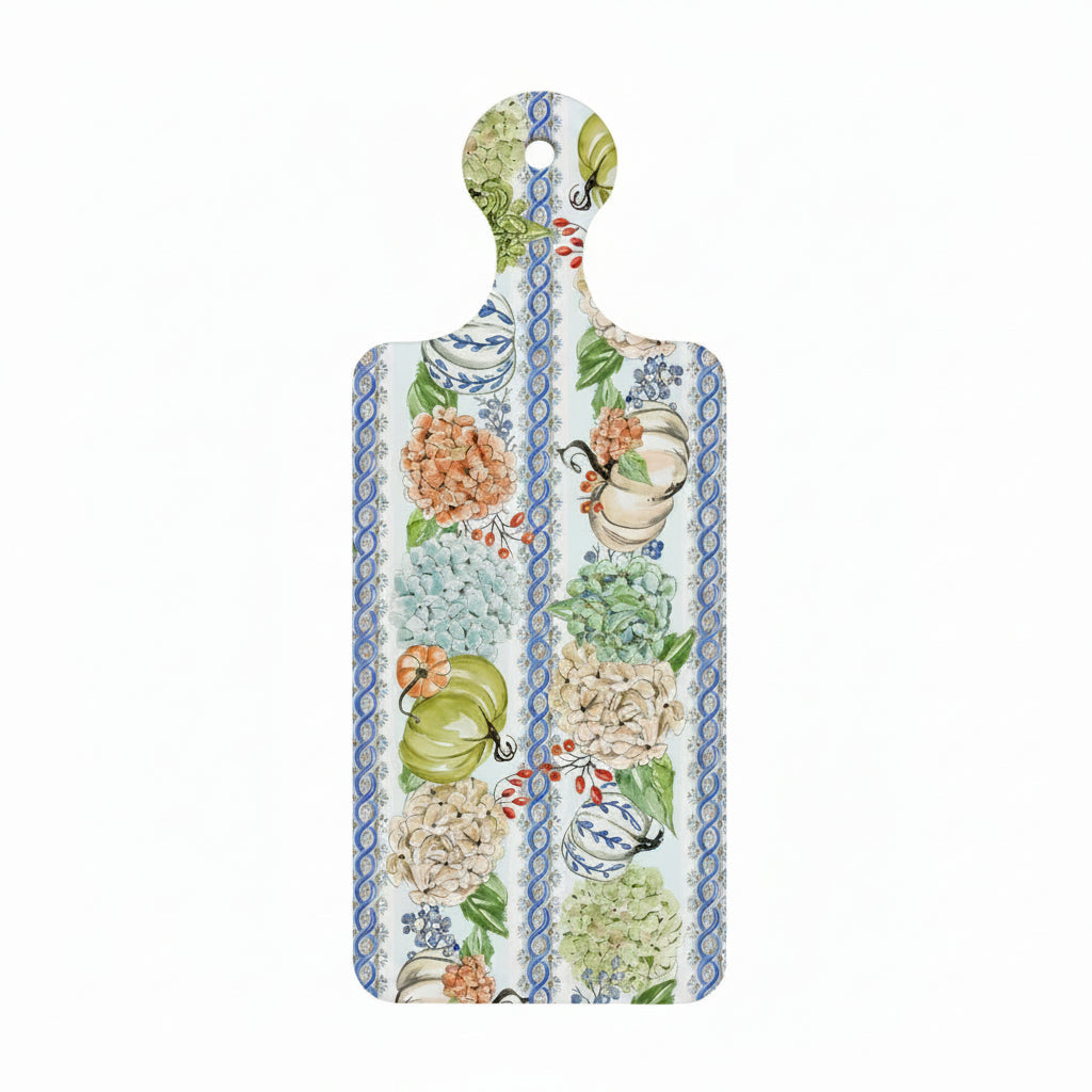 ceramic trivet with a handled board shape with hydrangea and pumpkin pattern between rows of a lattice design