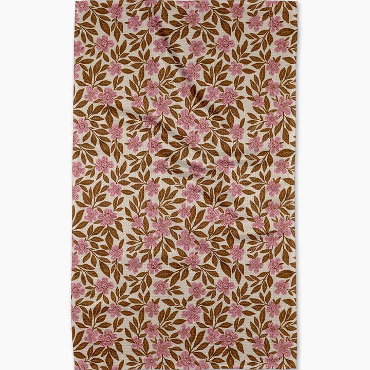 floral meadow tea towel laying flat on a white background