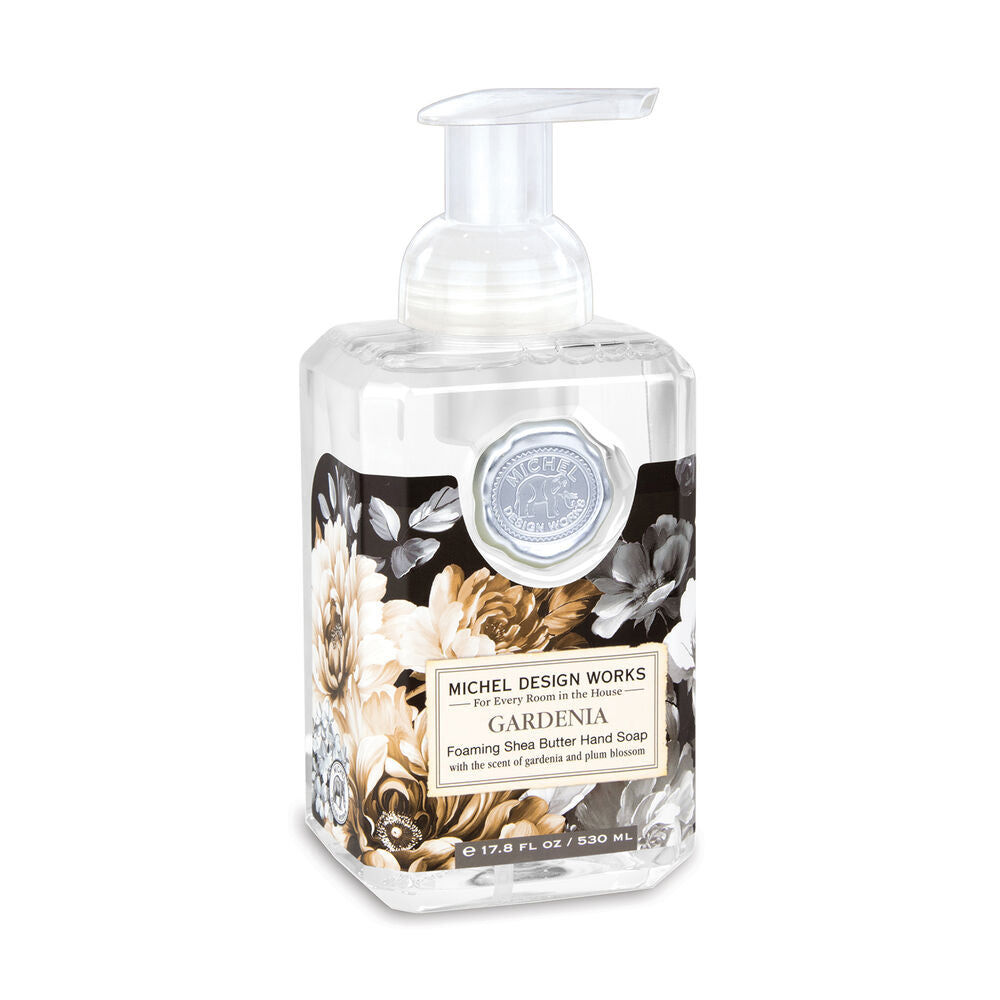 pump bottle of Gardenia Foaming Hand Soap with label printed with black, white, and brown florals.