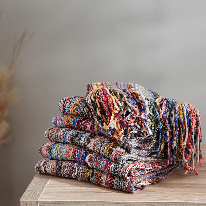 stack of folded Happy Squiggles Scarfs