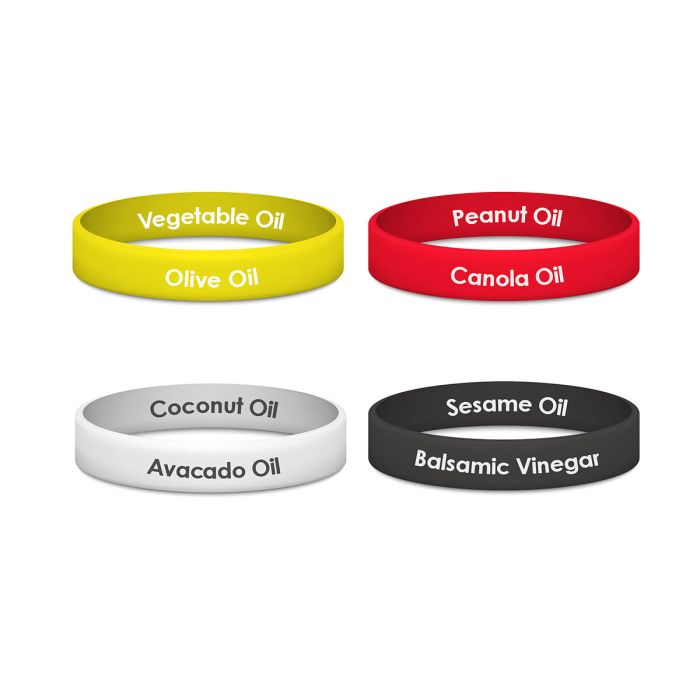 Four colorful silicone rings labeled with different oils on a white background