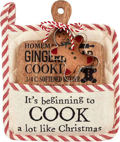 "cook like christmas" Pot Holder and Board Set stacked together.