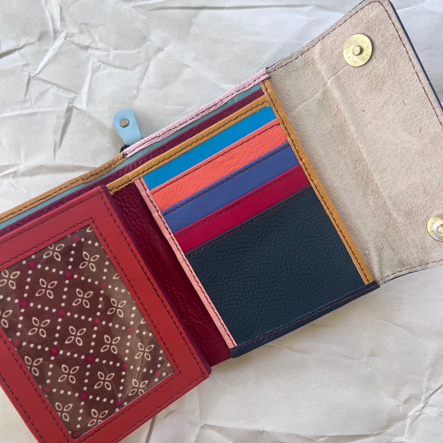 wheat rings wallet laying open showing colorful card slots