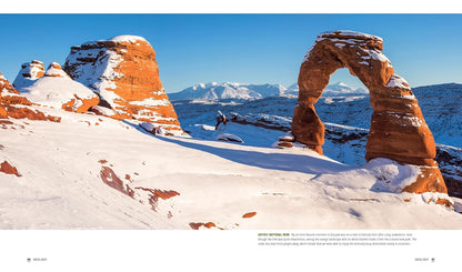 sample pages from Park Lands book with image of arches national park showing Snow-covered rock formations in a desert landscape with mountains in the background.