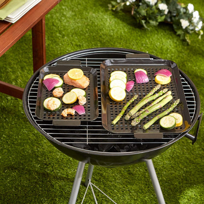 Porcelain Coated Grill Toppers with veggie on them on a grill