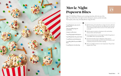 A two-page recipe spread for 'Movie Night Popcorn Bites'. The left page features a styled flat-lay of prepared popcorn balls with sprinkles, pretzels, and a red-and-white striped popcorn bucket on a mint background, alongside the ingredients and instructions on the right page.