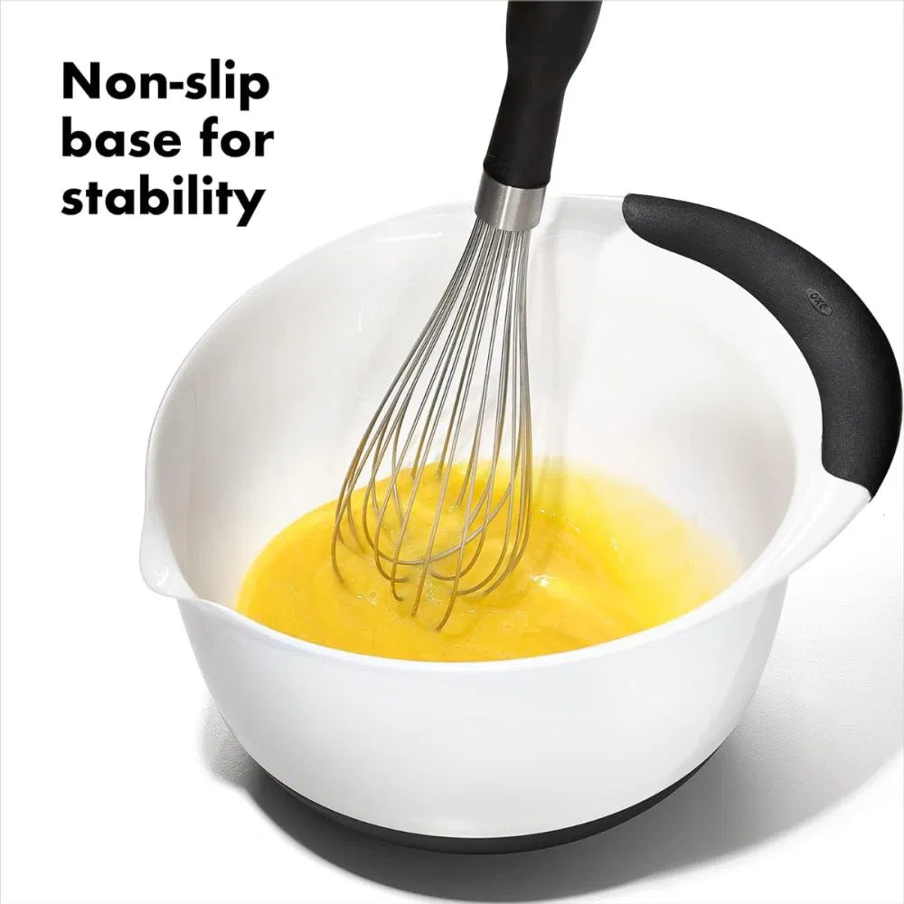 Good Grips Mixing Bowl with eggs and a whisk in it