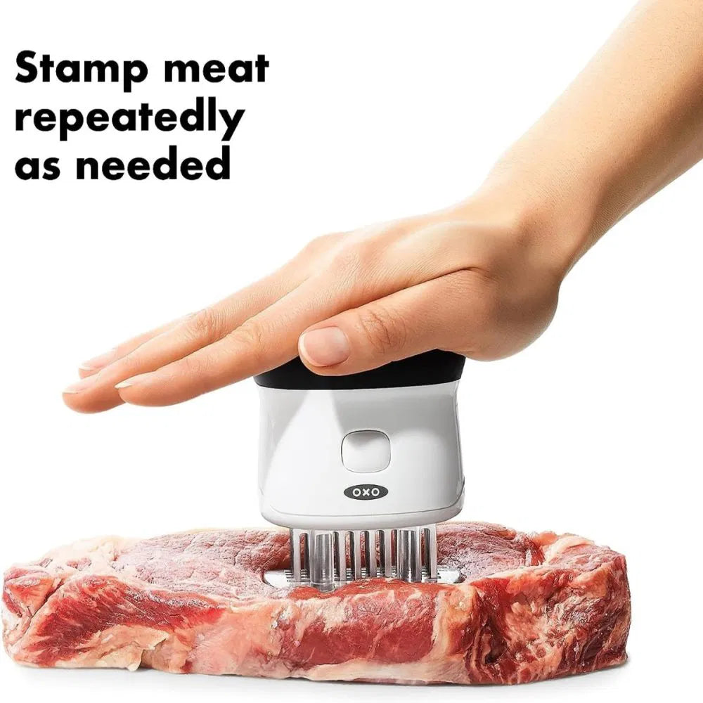 hand using Bladed Meat Tenderizer on a piece of meat