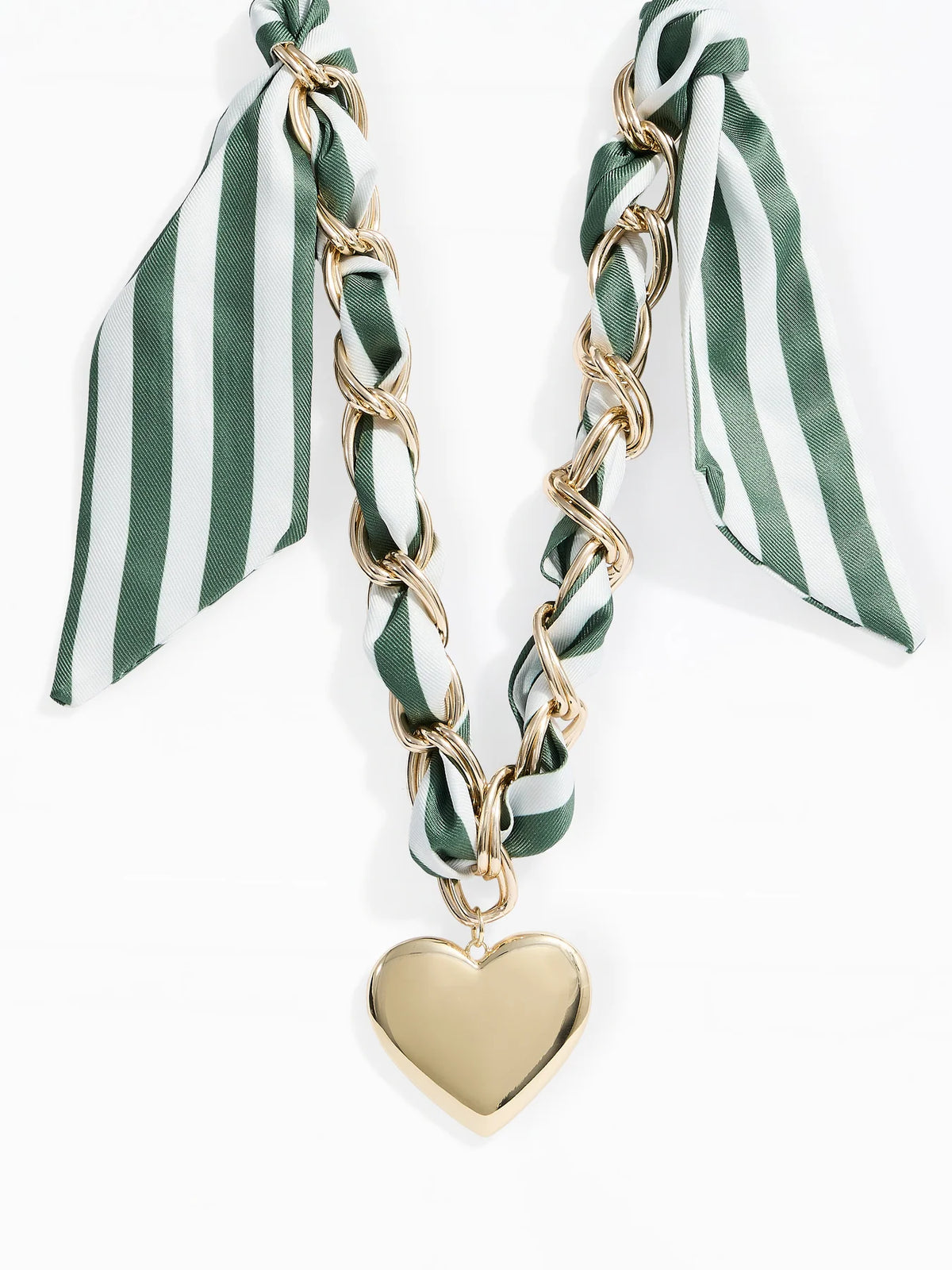 A gold chain necklace featuring a twisted link design, adorned with a green and white striped scarf tied at the top, and a polished gold heart pendant hanging from the center.